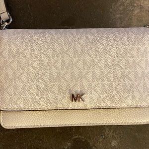Michael Khors crossbody whine case and wallet